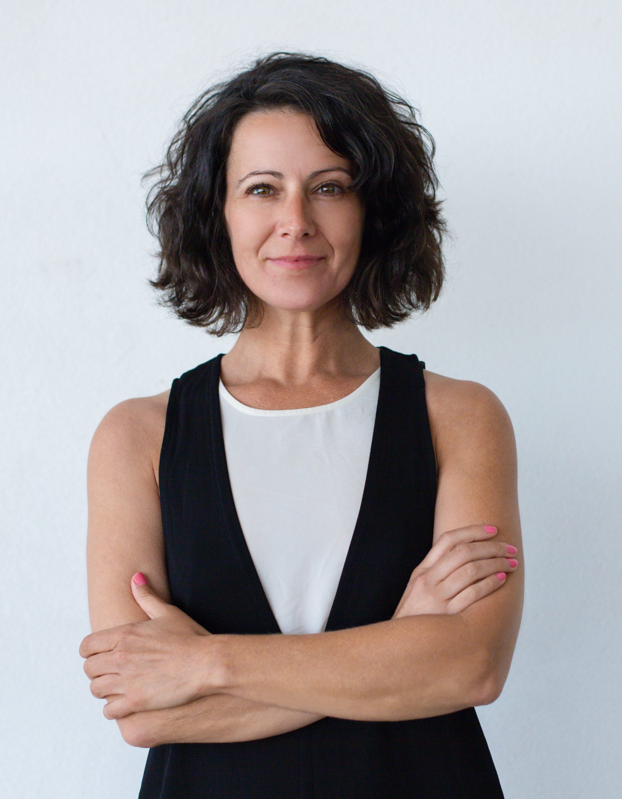 cheerful middle aged woman with curly hair min masolata cheerful middle aged woman with curly hair min masolata